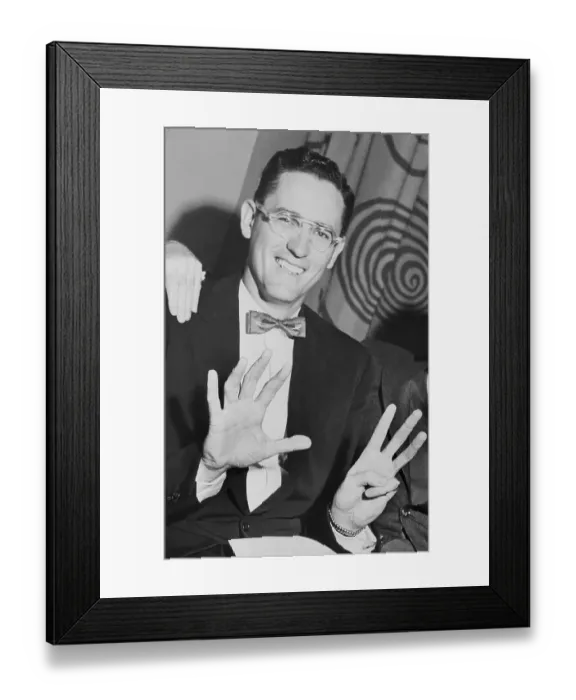 Framed Print : George Mikan Holding Up Eight Fingers Framed Print : George Mikan Holding Up Eight Fingers