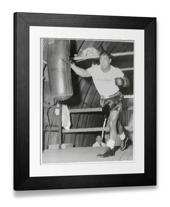Framed Print : Rocky Marciano Hitting a Punching Bag Framed Print : Rocky Marciano Hitting a Punching Bag