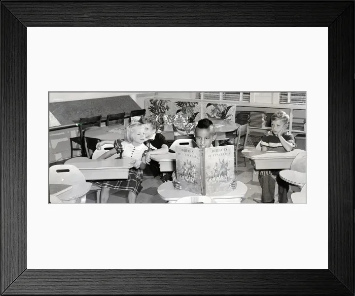 Framed Print : Indian Boy Reading In White Classroom