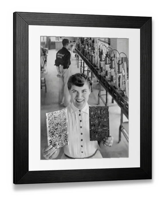Framed Print : Employee Showing Printed Circuits Framed Print : Employee Showing Printed Circuits