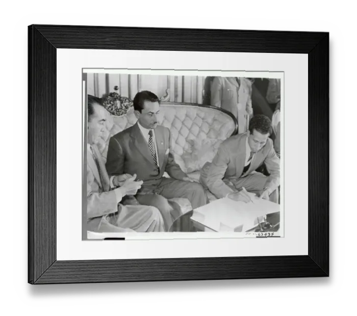 Framed Print : Enrique Oliva Signing a Document Framed Print : Enrique Oliva Signing a Document