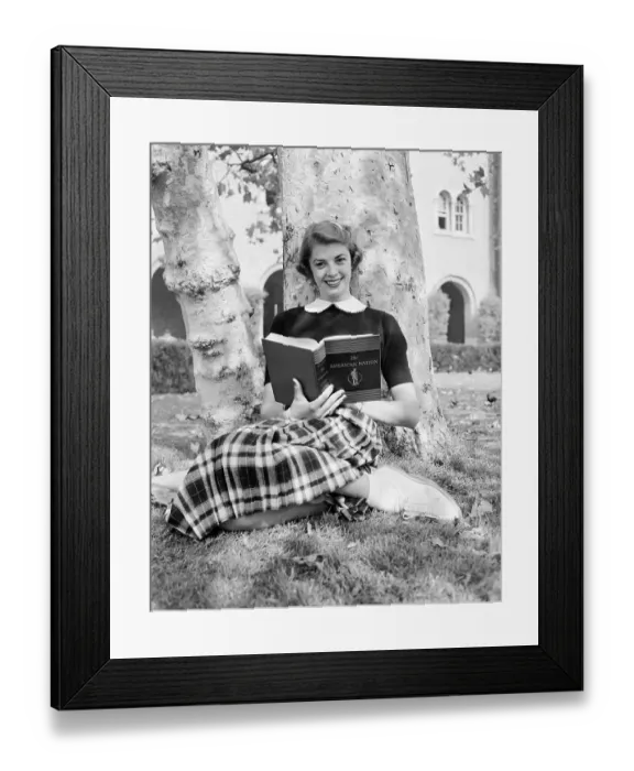 Framed Print : Student Reading book Under Tree Framed Print : Student Reading book Under Tree