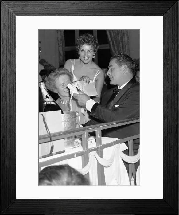 Framed Print : Errol Flynn Winning a Bottle of Perfume Framed Print : Errol Flynn Winning a Bottle of Perfume
