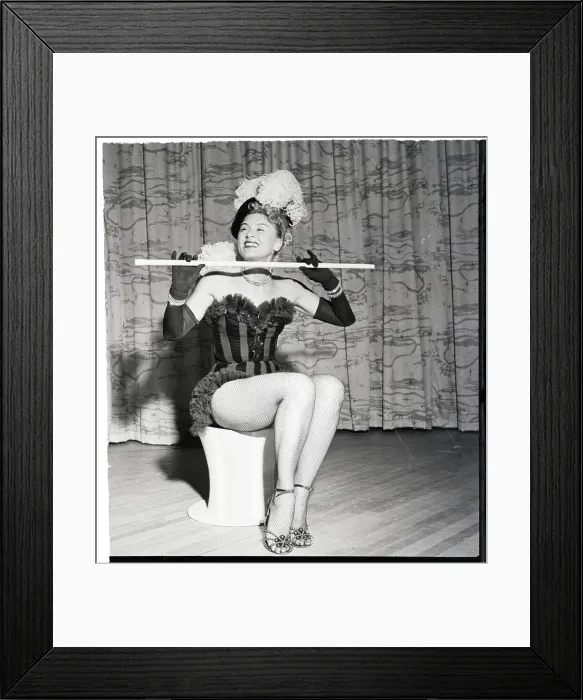 Framed Print : Performer Seated With Baton, In Bustier Framed Print : Performer Seated With Baton, In Bustier