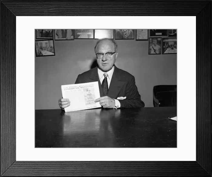 Framed Print : Avery Brundage Holding a Newspaper Framed Print : Avery Brundage Holding a Newspaper