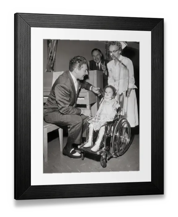 Framed Print : Girl with Polio Throwing Switch Held by Liberace Framed Print : Girl with Polio Throwing Switch Held by Liberace