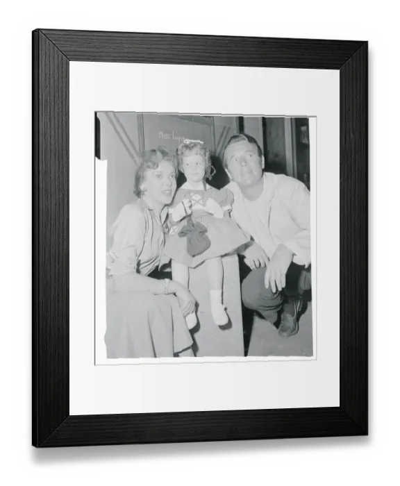 Framed Print : Ida Lupino and Howard Duff Holding Child Framed Print : Ida Lupino and Howard Duff Holding Child