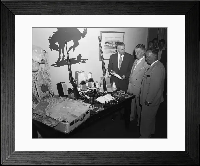 Framed Print : James Ryan Looking Over Confiscated Narcotics