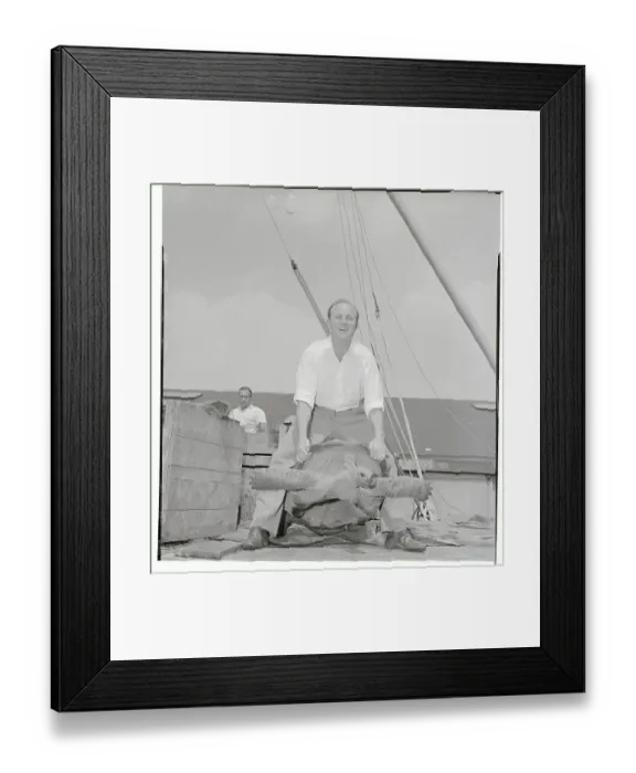 Framed Print : Reggie Brown Holding a Tortoise Framed Print : Reggie Brown Holding a Tortoise
