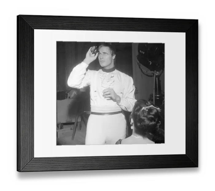 Framed Print : Marlon Brando Inspecting Slides Framed Print : Marlon Brando Inspecting Slides
