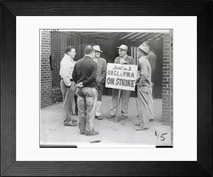 Framed Print : Man Holding Sign in Picket Framed Print : Man Holding Sign in Picket