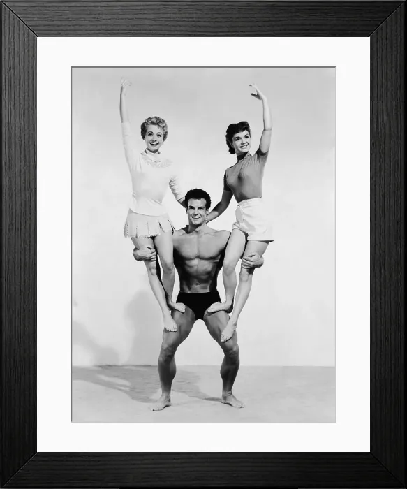 Framed Print : Mr. Universe Holding Debbie Reynolds and Jane Powell