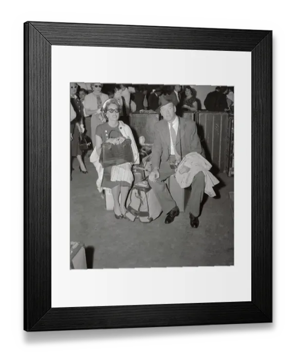 Framed Print : James Stewart and Wife Sitting on Luggage Framed Print : James Stewart and Wife Sitting on Luggage