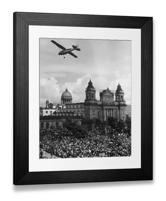 Framed Print : Plane Over Crowd in Front of Cathedral Framed Print : Plane Over Crowd in Front of Cathedral