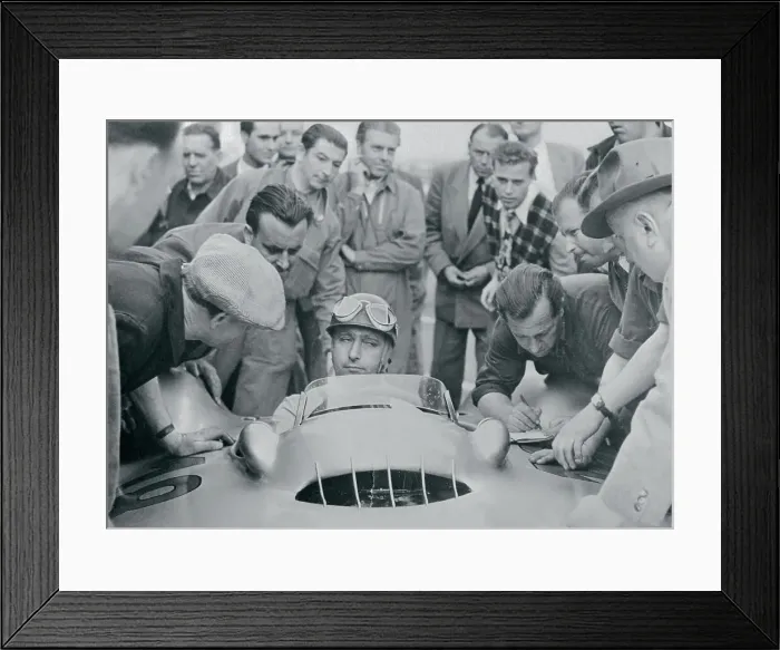 Framed Print : Newsmen and Mechanics Surround Driver Juan Manuel Fangio Framed Print : Newsmen and Mechanics Surround Driver Juan Manuel Fangio