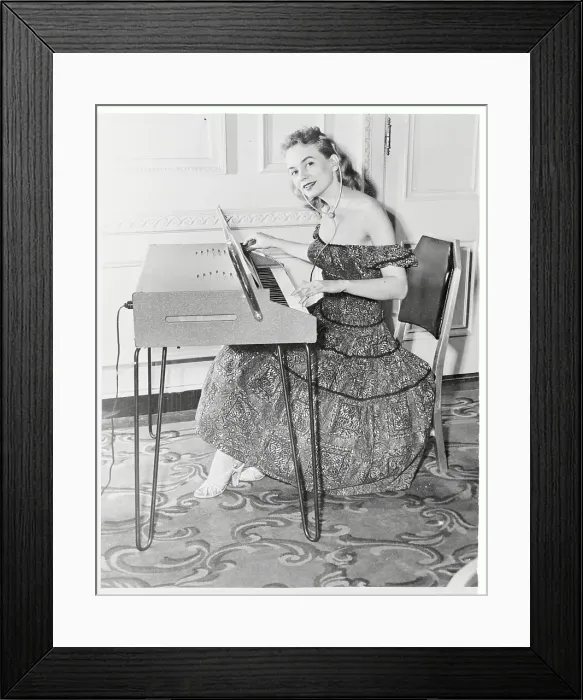 Framed Print : Young Woman Playing Electric Piano Framed Print : Young Woman Playing Electric Piano