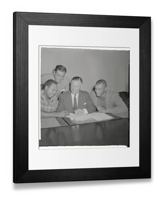 Framed Print : Archie Moore Signing His Contract Framed Print : Archie Moore Signing His Contract