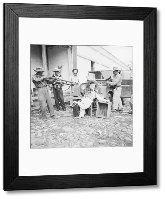 Framed Print : Soldiers Hold Guns on Effigy of Arbenz Framed Print : Soldiers Hold Guns on Effigy of Arbenz