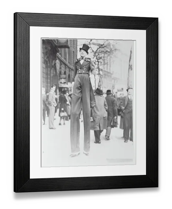 Framed Print : Stilt Walker Strolling with Pedestrians Framed Print : Stilt Walker Strolling with Pedestrians