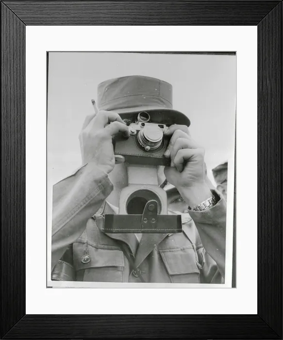 Framed Print : Man Taking Picture with Lens Cap Framed Print : Man Taking Picture with Lens Cap