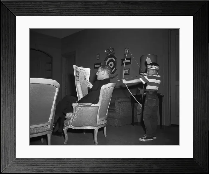 Framed Print : Al Gore Pointing a Bow and Arrow at Senator Albert Gore's Head Framed Print : Al Gore Pointing a Bow and Arrow at Senator Albert Gore's Head