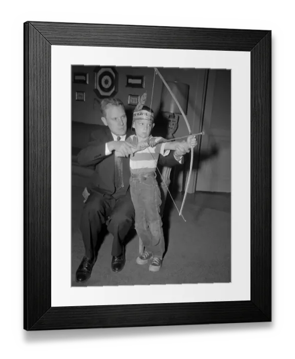 Framed Print : Senator Albert Gore and Son Playing Bow and Arrow Framed Print : Senator Albert Gore and Son Playing Bow and Arrow