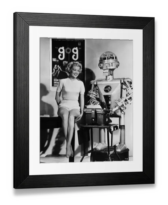 Framed Print : Sally Mansfield Sitting Beside Garco Robot Framed Print : Sally Mansfield Sitting Beside Garco Robot