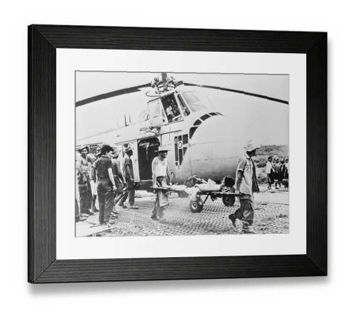 Framed Print : Wounded Soldier Taken from Helicopter Framed Print : Wounded Soldier Taken from Helicopter