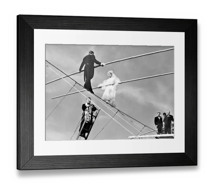 Framed Print : French Bride and Groom on a High Wire with Attending Priest Framed Print : French Bride and Groom on a High Wire with Attending Priest