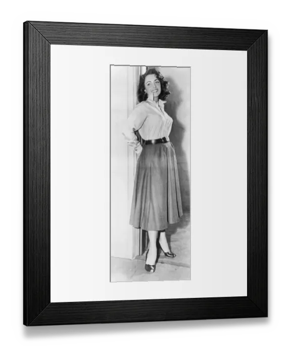 Framed Print : Actress Elizabeth Taylor Posing Against Door Frame Framed Print : Actress Elizabeth Taylor Posing Against Door Frame