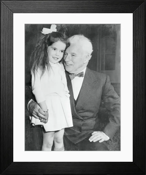 Framed Print : Charlie Chaplin with Daughter Framed Print : Charlie Chaplin with Daughter