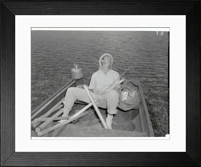 Framed Print : Ted Williams Sitting in Boat with Fishing Rod Framed Print : Ted Williams Sitting in Boat with Fishing Rod