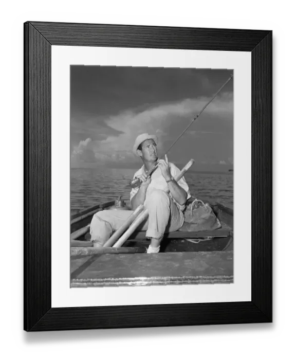 Framed Print : Ted Williams Sitting in Boat with Extended Fishing Rod Framed Print : Ted Williams Sitting in Boat with Extended Fishing Rod
