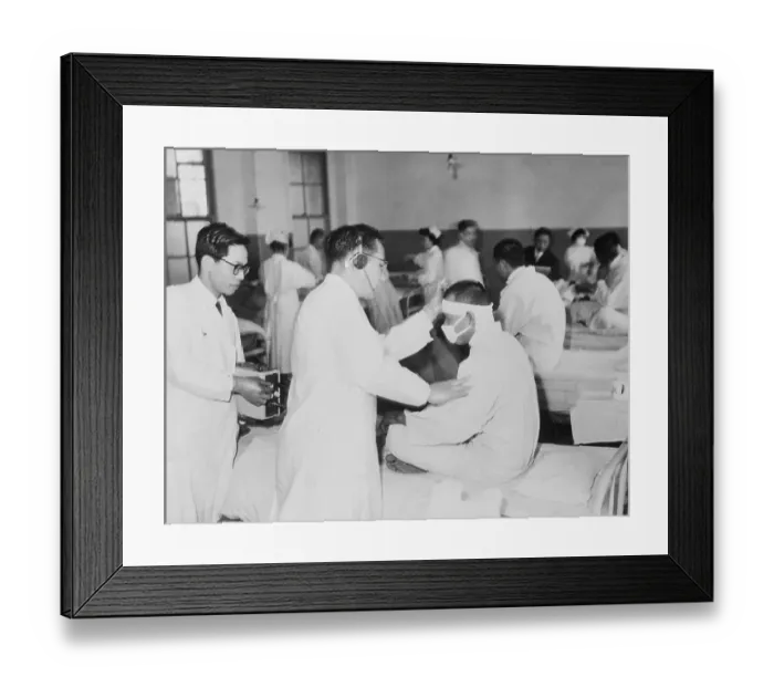 Framed Print : Doctor Examining Crew Member