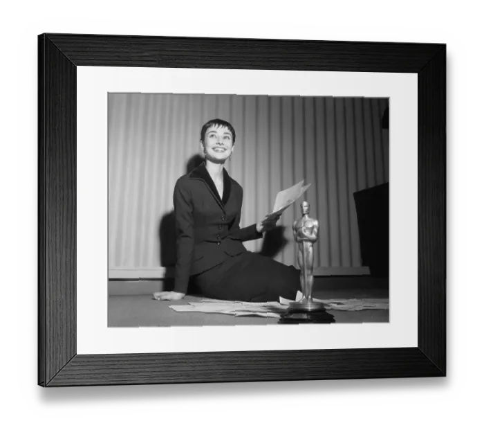 Framed Print : Audrey Hepburn with Oscar Holding Telegrams Framed Print : Audrey Hepburn with Oscar Holding Telegrams