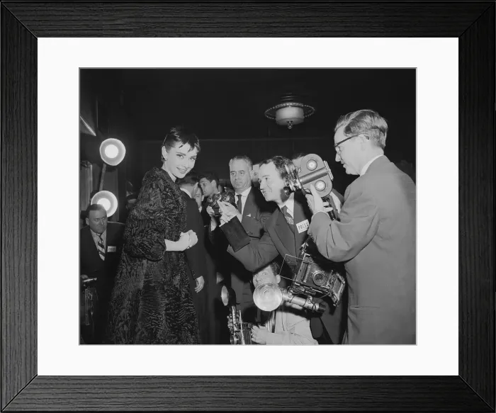 Framed Print : Audrey Hepburn with Reporters after Winning Oscar Framed Print : Audrey Hepburn with Reporters after Winning Oscar