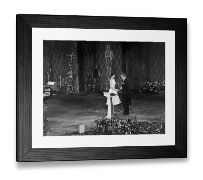 Framed Print : Audrey Hepburn Accepting Oscar from Jean Hersholt Framed Print : Audrey Hepburn Accepting Oscar from Jean Hersholt