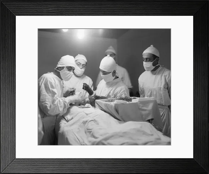 Framed Print : Surgeon Grafting Skin Onto Neck Of Patie Framed Print : Surgeon Grafting Skin Onto Neck Of Patie