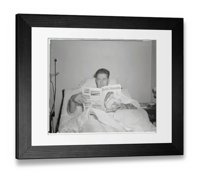 Framed Print : Ted Williams Reading a Magazine Framed Print : Ted Williams Reading a Magazine