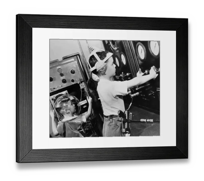 Framed Print : Children Operating a Flight Simulator Framed Print : Children Operating a Flight Simulator