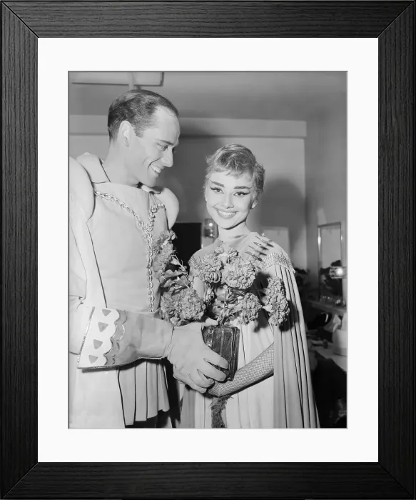 Framed Print : Mel Ferrer Giving Audrey Hepburn Flowers Framed Print : Mel Ferrer Giving Audrey Hepburn Flowers