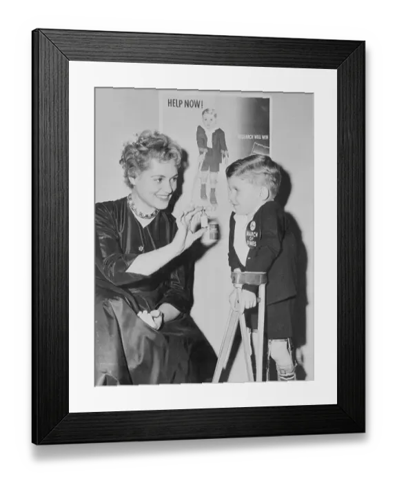 Framed Print : Comedienne Actress Judy Holliday with Polio Poster Boy Framed Print : Comedienne Actress Judy Holliday with Polio Poster Boy