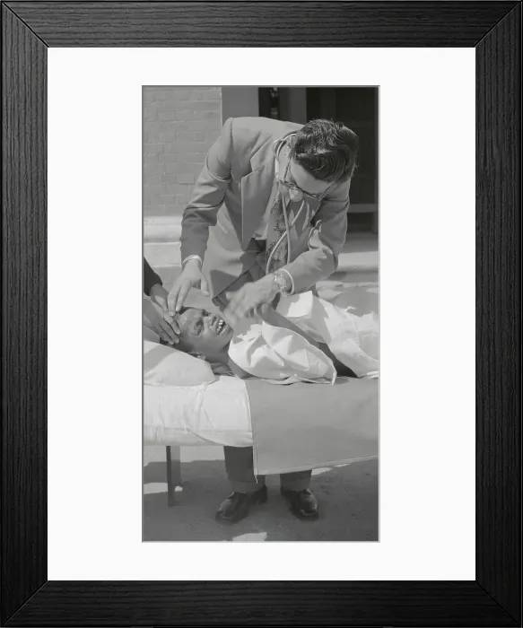 Framed Print : Wolf Boy Being Cared for by Doctor Framed Print : Wolf Boy Being Cared for by Doctor