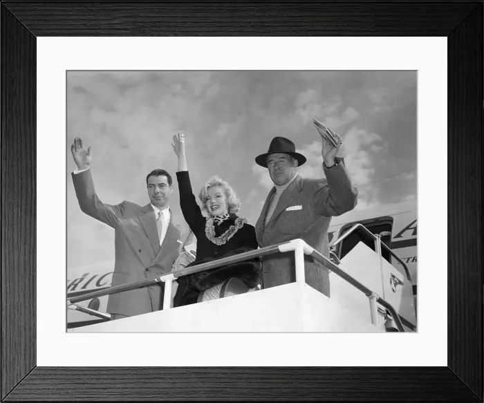 Framed Print : Marilyn Monroe and Joe DiMaggio Waving From Plane Framed Print : Marilyn Monroe and Joe DiMaggio Waving From Plane