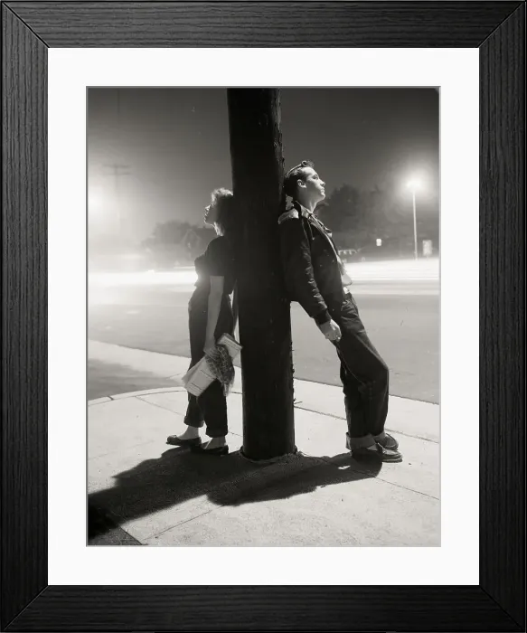 Framed Print : Teenagers Leaning on Utility Pole Framed Print : Teenagers Leaning on Utility Pole