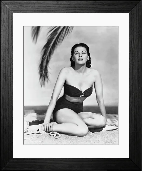 Framed Print : Yvonne De Carlo Sitting on Sandy Beach Framed Print : Yvonne De Carlo Sitting on Sandy Beach