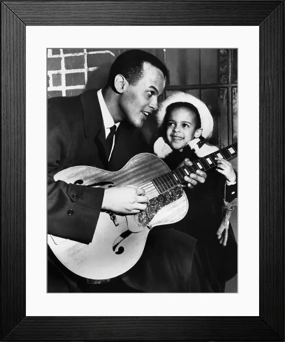 Framed Print : Harry Belafonte Holding Daughter and Guitar Framed Print : Harry Belafonte Holding Daughter and Guitar