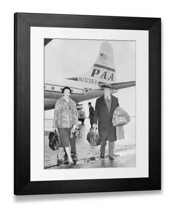 Framed Print : Eve Curie and Her Husband Departing From a Plane Framed Print : Eve Curie and Her Husband Departing From a Plane