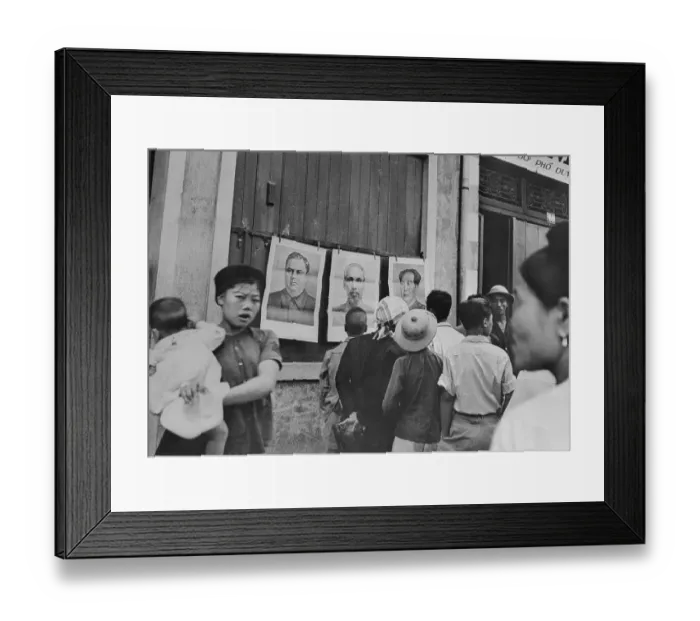 Framed Print : North Vietnamese Looking at Portraits of Communist Leaders