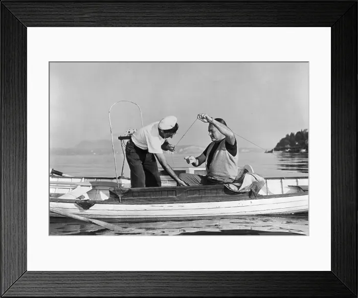 Framed Print : Author Ernest Hemingway Fishing from His Boat Framed Print : Author Ernest Hemingway Fishing from His Boat